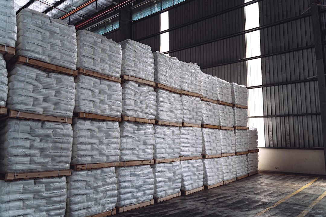 Coated vs uncoated FIBC bags stored in an industrial warehouse